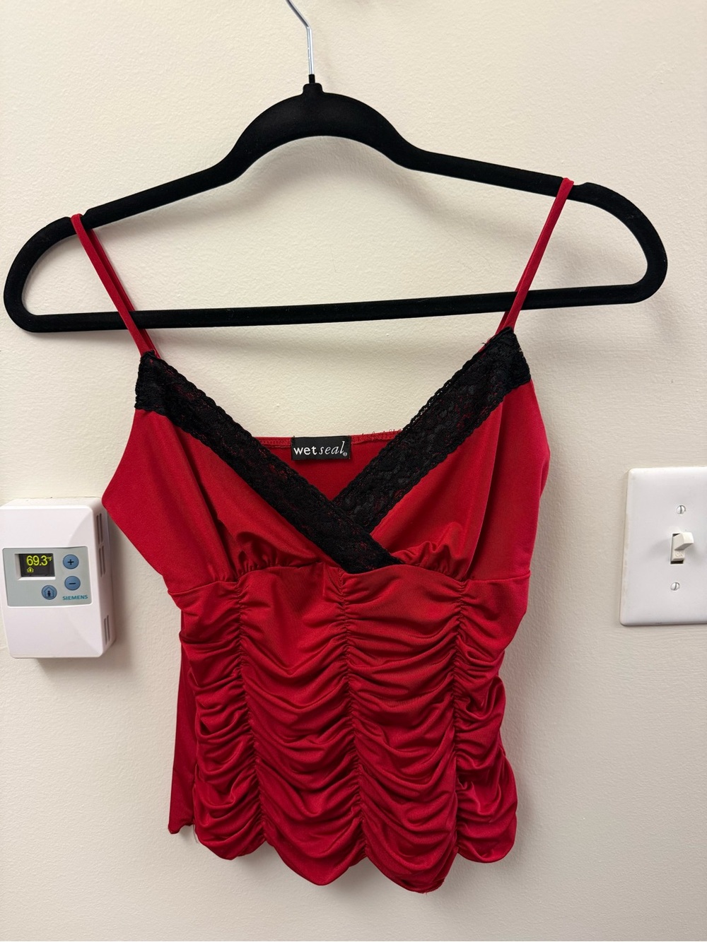 red camisole with black lace trim